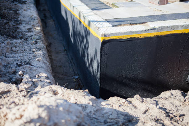 Professional Waterproofing technician working in Empire, AL